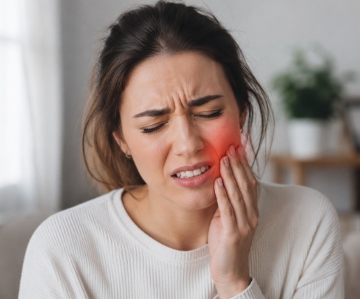 Woman experiencing tooth pain